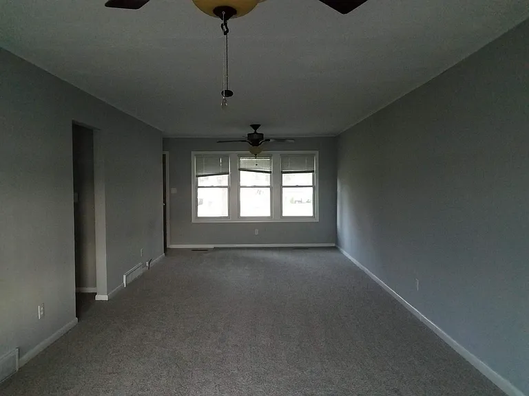 Living room Fresh paint and new carpet through out