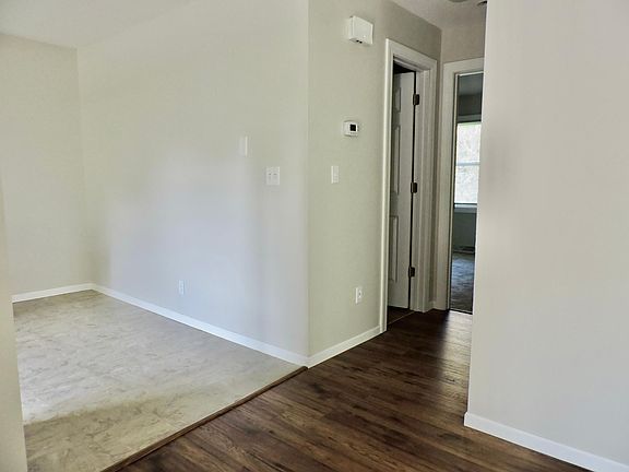 Living Room/Hallway. Kitchen on left with room for table.