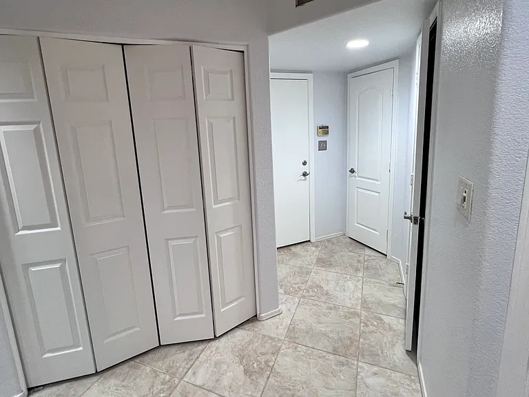 New accordion doors in front of washer and dryer