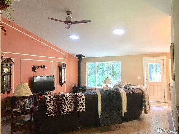 Vaulted ceilings and solar tubes make a big and bright living room