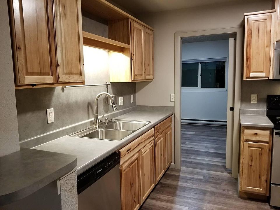 Kitchen with bedroom behind