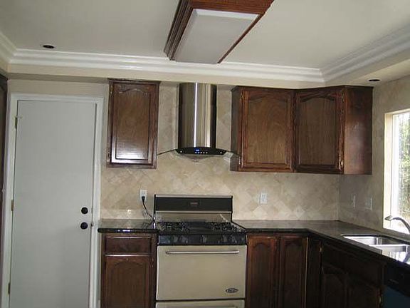 Granite Counters, Custom Cabinetry, Stainless Appliances