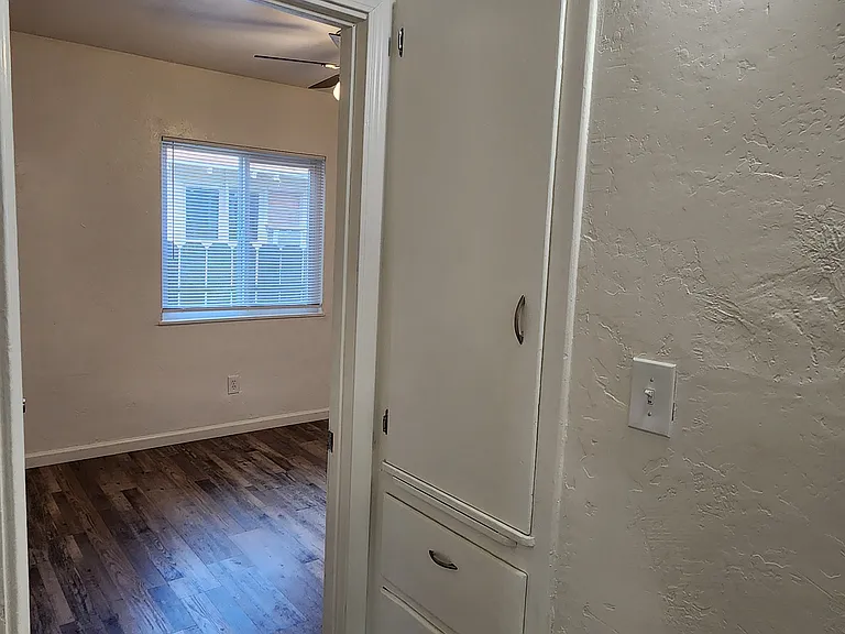 Hallway with view to back bedroom