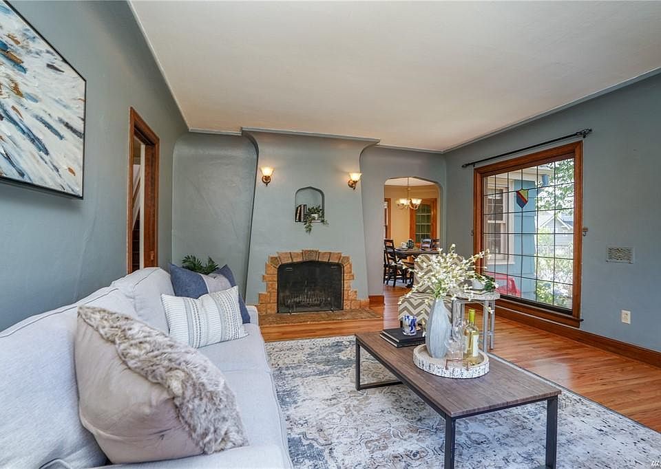 Living room with wood burning fireplace