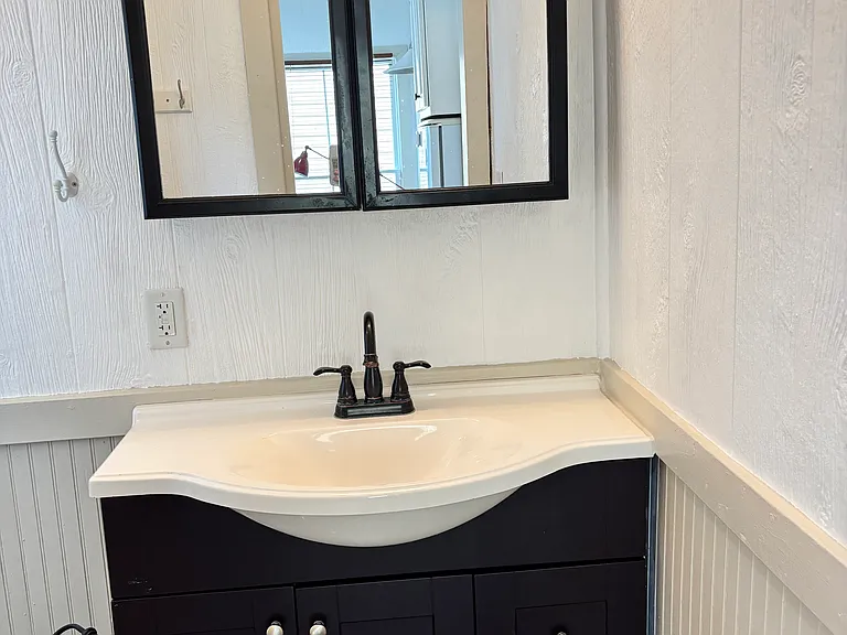 Large vanity and medicine cabinet.