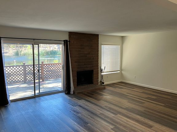 Large 21 ft x 13 ft 
family room looking out to Pond