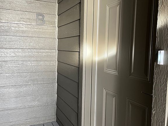 Covered entrance to Unit B apartment