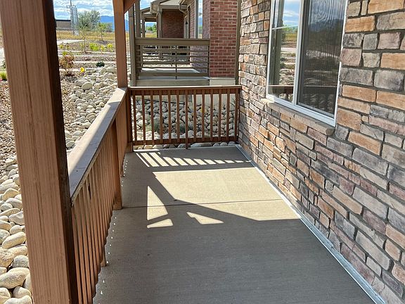 Large front porch facing open space