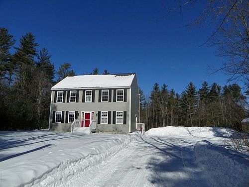 Sets well back from road