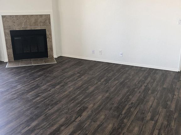 Living Room with Wood Burning Fireplace