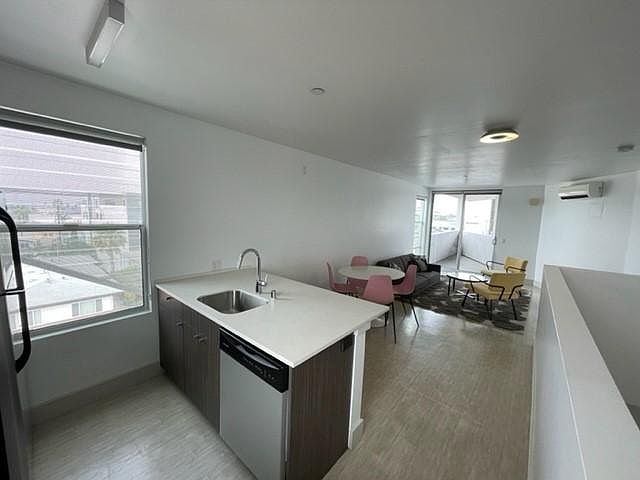 OPEN PLAN design w big kitchen island -perfect for entertaining