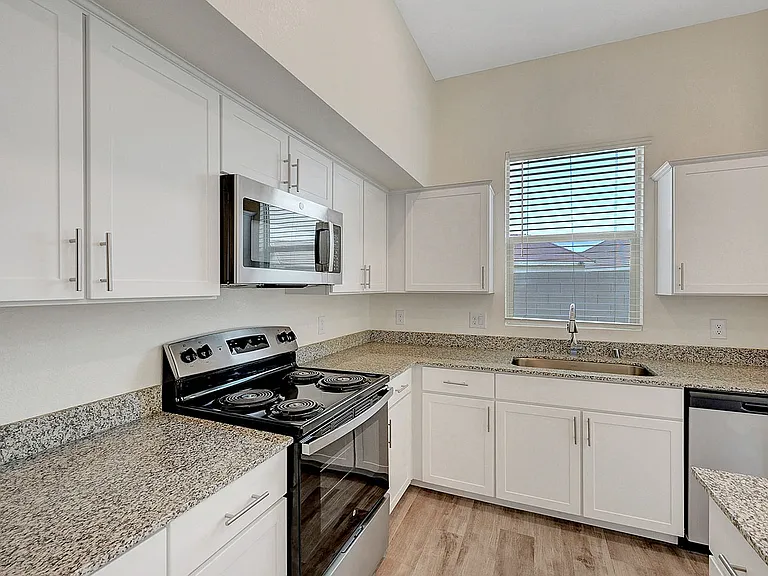 Experience modern convenience in this stylishly designed kitchen.