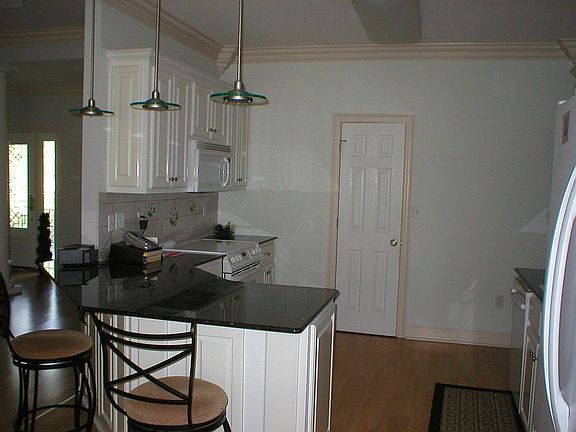 Kitchen with bar stools
