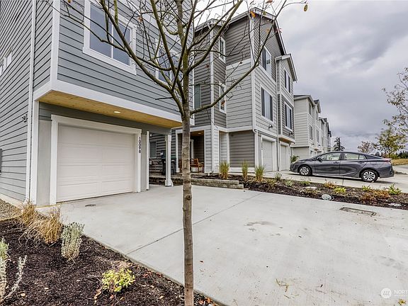 2nd image of 10098 Kings Landing Ave NW #65