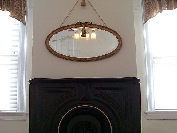 Decortive Stone Mantel in Front Bedroom