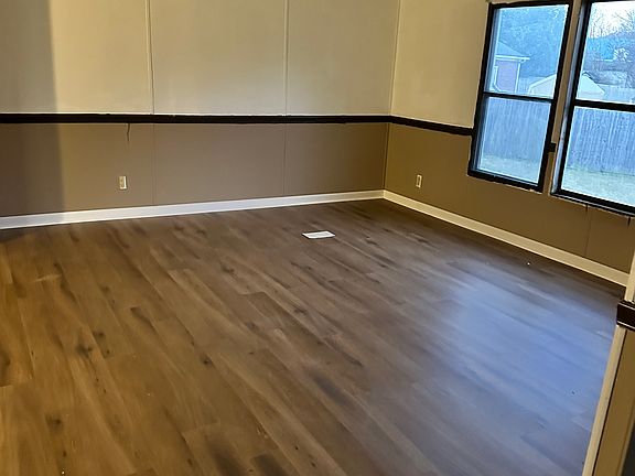Den or dining room adjacent to kitchen