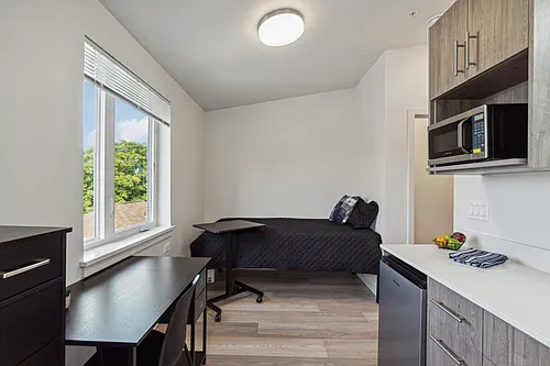 Modern Studio Living Just Steps from UW The Row Apartments Photo 1