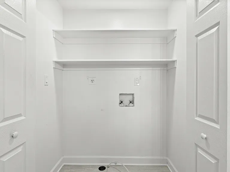 Efficiently designed laundry nook perfect for urban living. Efficiently designed laundry nook perfect for urban living.