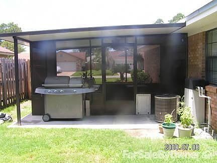 Patio w/ BBQ Overhang & Dog door