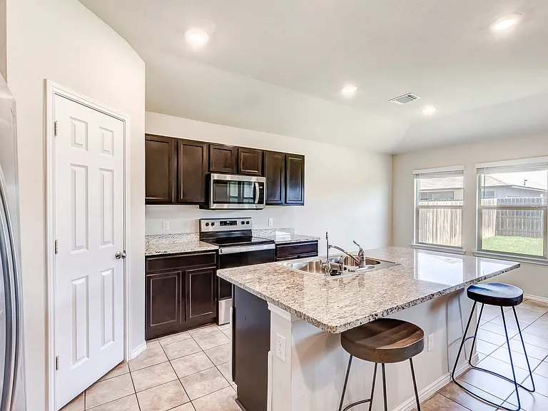 6107 Sally Ride Ln — Photo 12