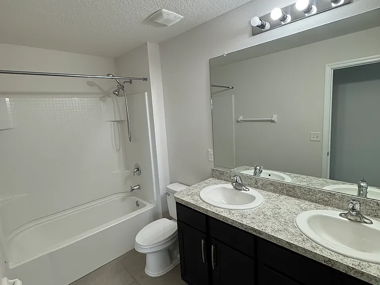 12034 Suburban Sunrise St — Photo 10