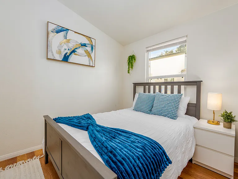 Unwind in comfort with our plush double bed in the first bedroom, designed to give you a restful night's sleep. Sink into soft, high-quality linens and fluffy pillows that make relaxation effortless