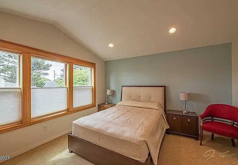 Master Bedroom with Vaulted Ceilings and Natural Light.