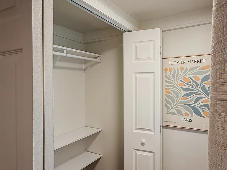 Built-in shelving in the second-bedroom closet