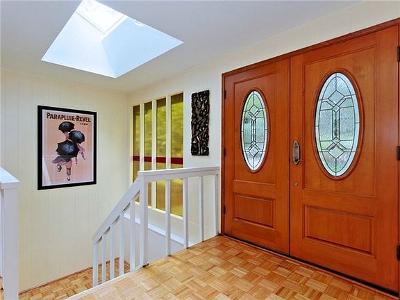 Entrance hall flooded with natural light.