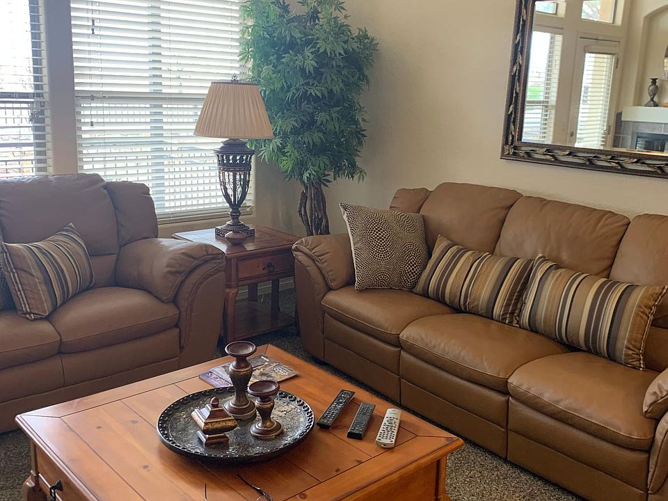 Natuzzi leather sofa, loveseat, and recliner.