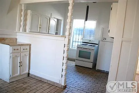 Open space between kitchen and dining area could be reconfigured