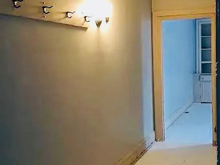 Hallway with linen closet