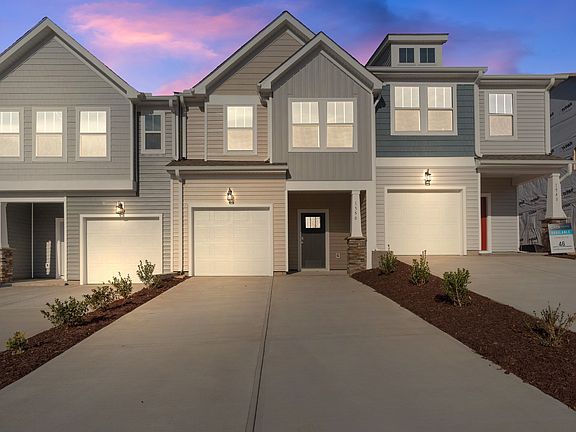 2 story townhome with large owner s suite, 2 car parking pad and patio