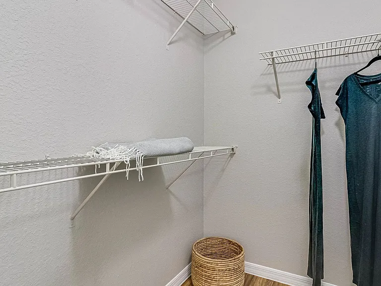 Enjoy the convenience of spacious walk-in closets with built-in organizers, designed to keep your wardrobe effortlessly neat and stylish.