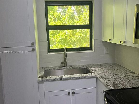 5th image of 7926 East Dr #104