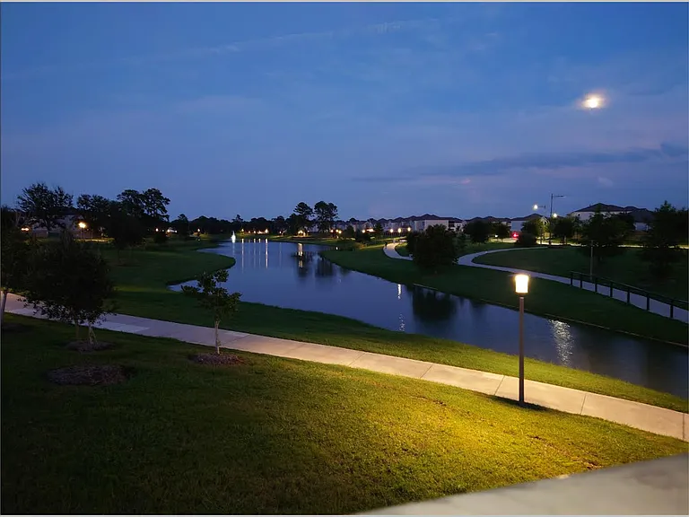 Walkway around the lake at night