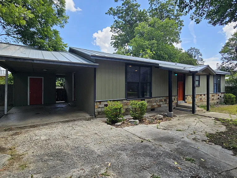 Front of House with carport