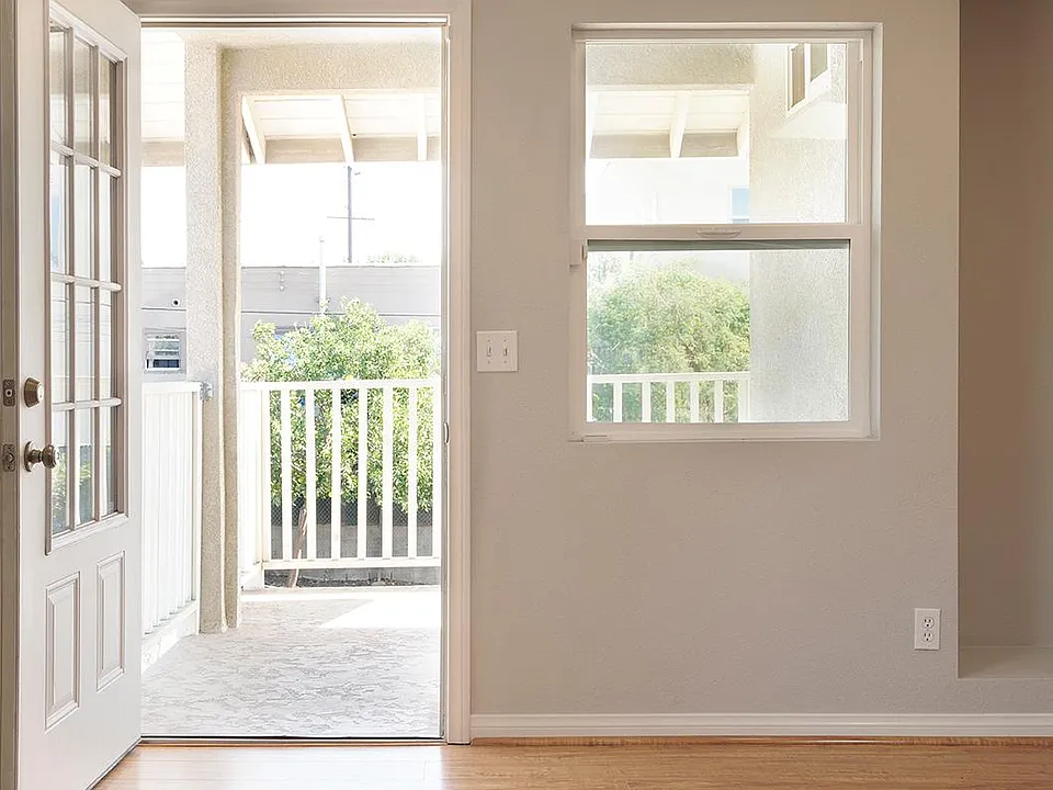View of covered entry porch from living area.