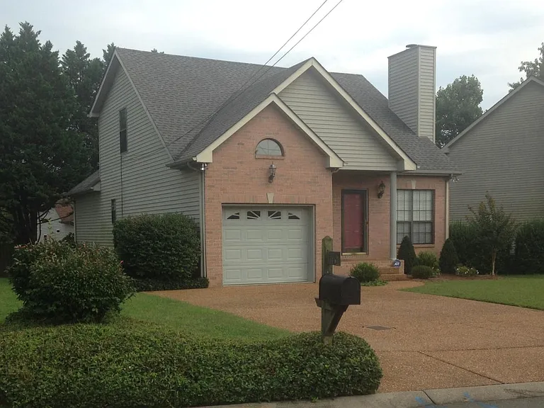 View from street. House is on the right.