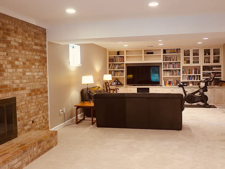 Lower level recreation room. Gas fireplace.