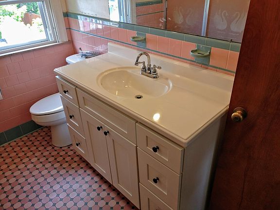 Bathroom with updated fixtures.