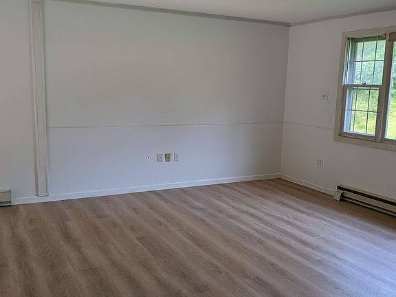 living room with fresh pain and new floors