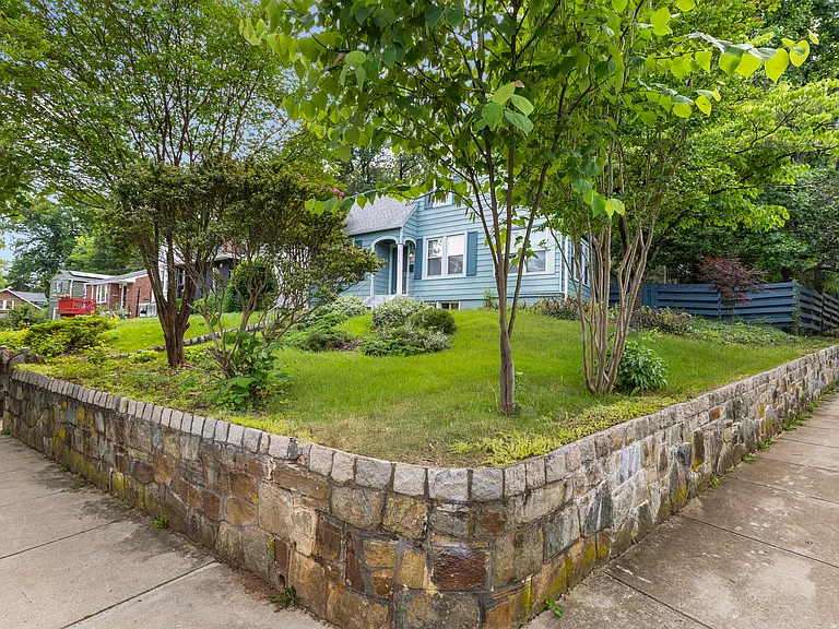 Beautifully landscaped stone retaining walls that wrap around the property.