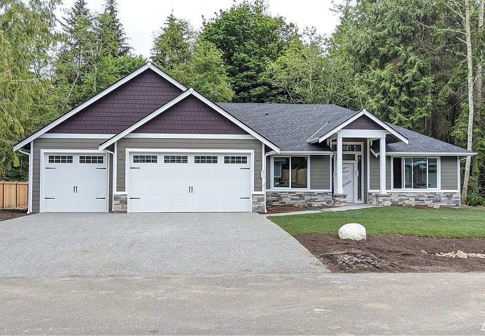 Spacious rambler in close to half acre lot (colors may vary)