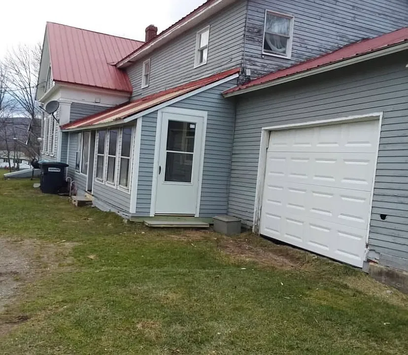 Entrance door and garage door