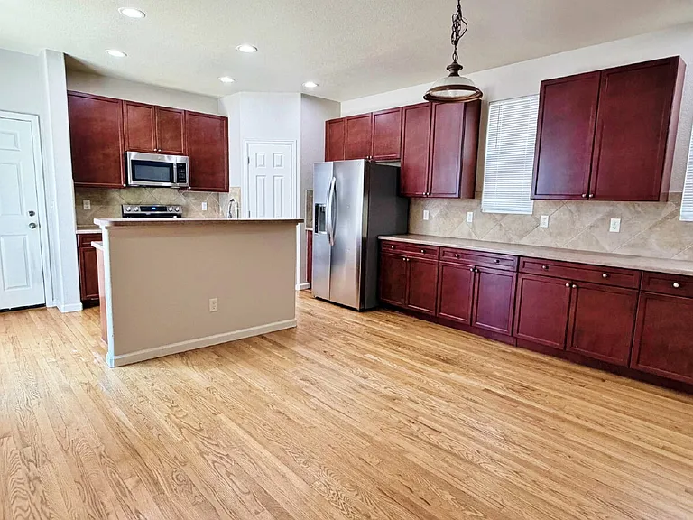 1323 S Duquesne Ct — Photo 3