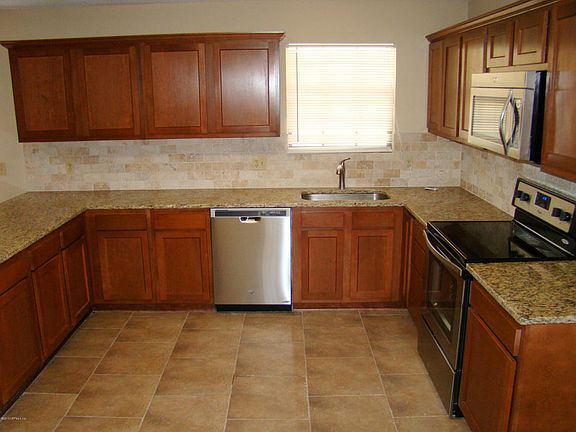 5th image of 6318 Whispering Oaks Dr W