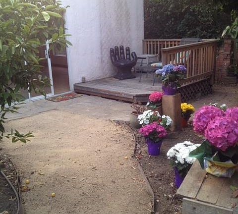 Back garden with tenants deck.