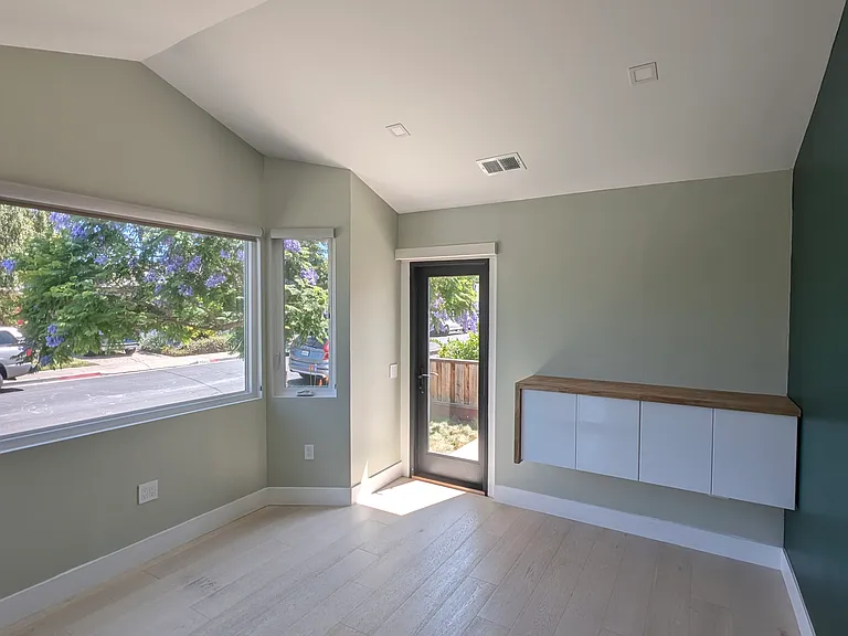 From office area, comes with access to the patio, and plenty of shelving and closet space. Lots of lighting