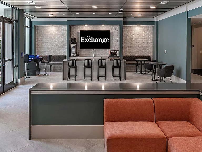 Experience contemporary comfort in this chic lobby space, perfect for gatherings and relaxation.